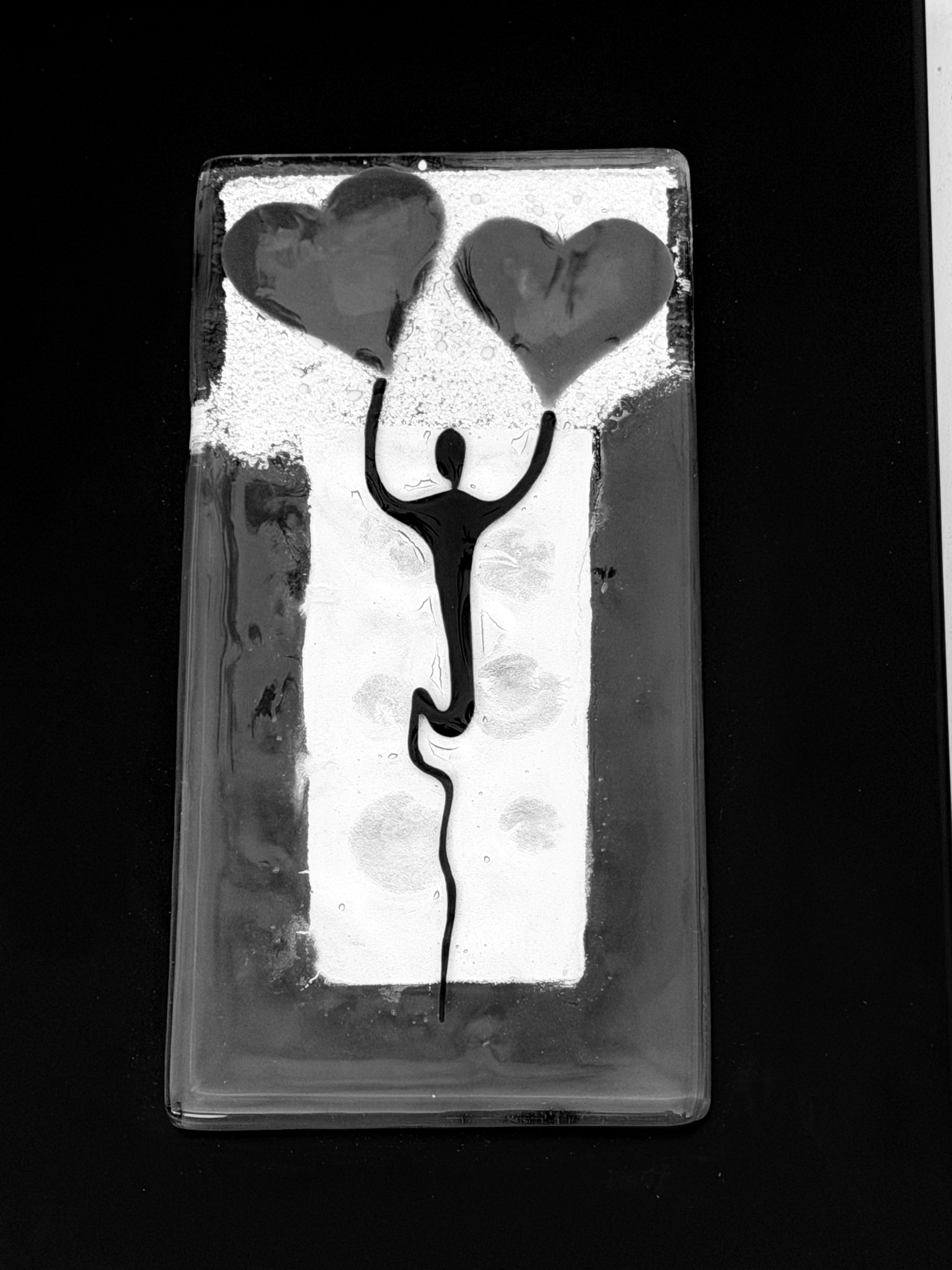 Figure Holding Hearts - Fused Glass Wall Art with Black Panel