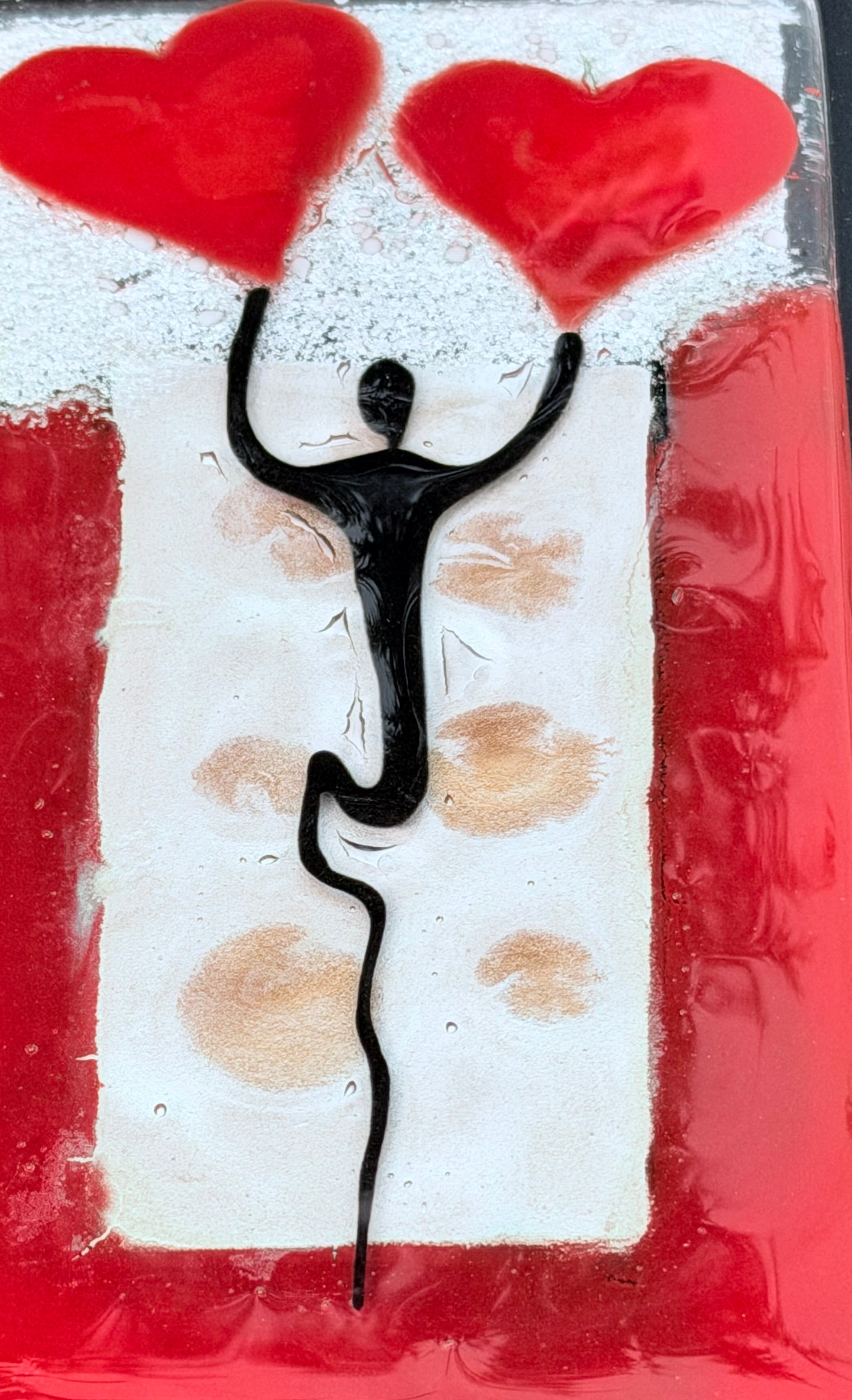 Figure Holding Hearts - Fused Glass Wall Art with Black Panel